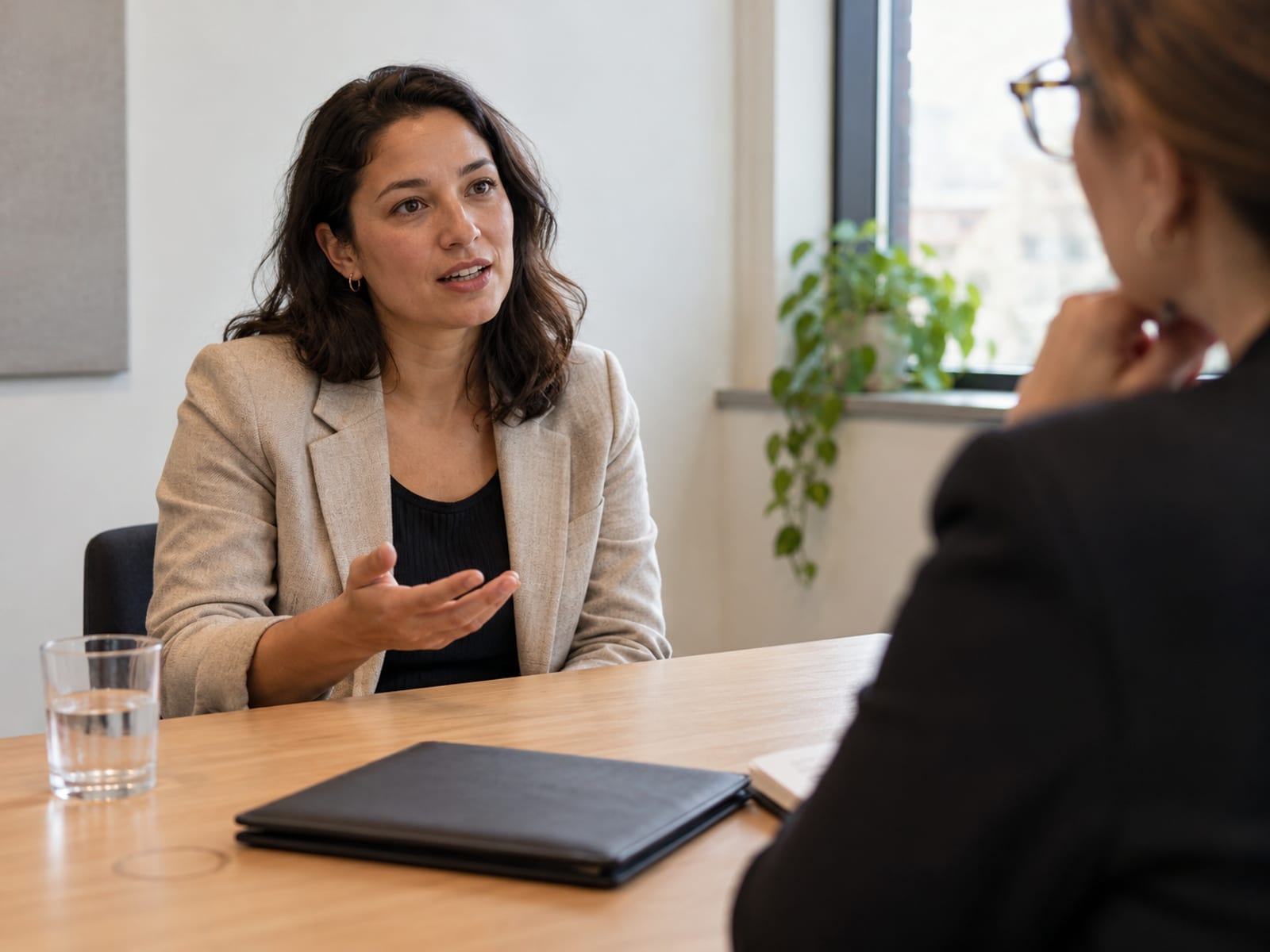 A woman giving an example during a job interview